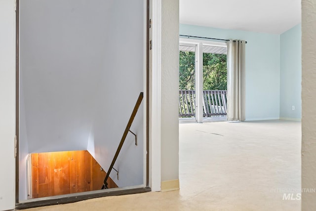 1015 24th St, Lewiston, ID 83501 - staircase featuring carpet and baseboards