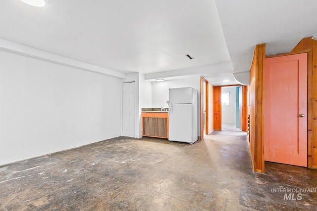 1015 24th St, Lewiston, ID 83501 - unfurnished living room featuring concrete flooring