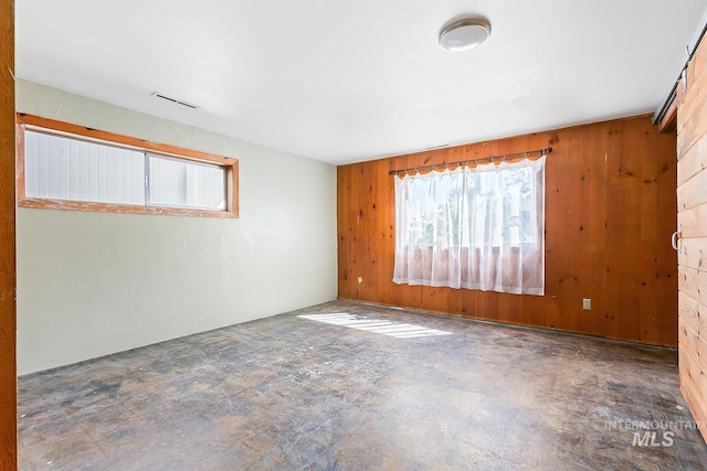 1015 24th St, Lewiston, ID 83501 - unfurnished room featuring wooden walls