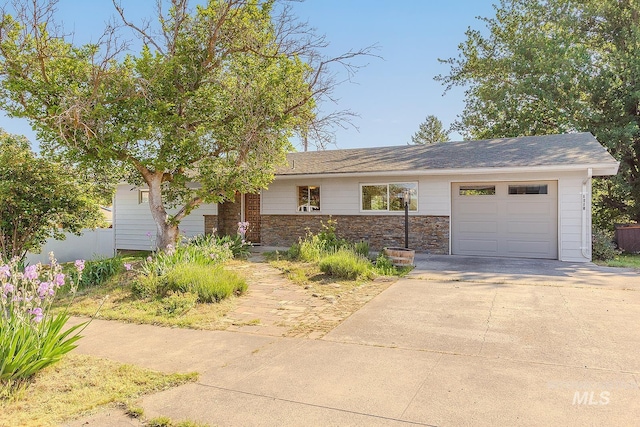 1015 24th St, Lewiston, ID 83501 - view of front facade with an attached garage and driveway