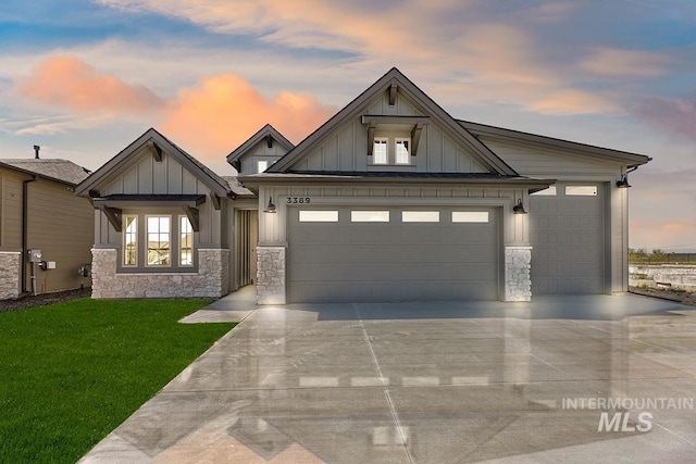3389 E Englehart Dr, Meridian, ID 83642 - view of front of home featuring board and batten siding, an attached garage, and driveway