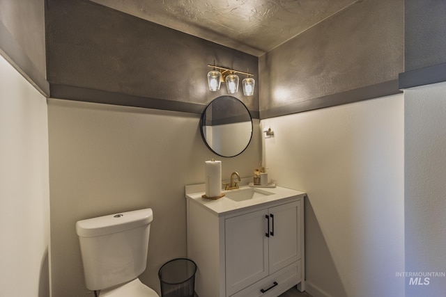 half bath with toilet and vanity