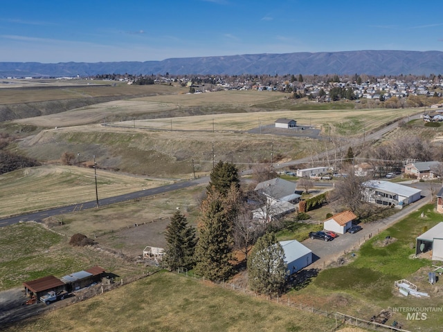 bird's eye view with a rural view and a mountain view