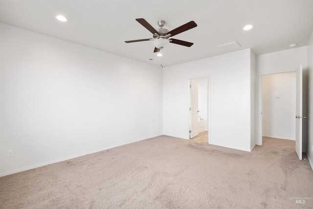 unfurnished bedroom with light carpet, baseboards, visible vents, ceiling fan, and recessed lighting