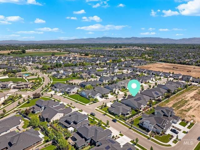 2843 E Murchison St, Meridian, ID 83642 - aerial view of property and surrounding area with a mountainous background and nearby suburban area