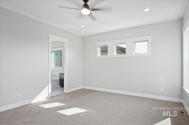 2843 E Murchison St, Meridian, ID 83642 - unfurnished bedroom with ornamental molding, light colored carpet, baseboards, recessed lighting, and connected bathroom