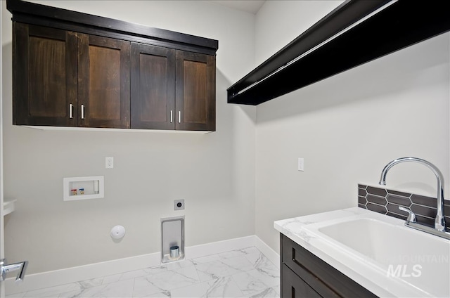 2843 E Murchison St, Meridian, ID 83642 - laundry room with washer hookup, cabinet space, light marble finish floors, baseboards, and electric dryer hookup