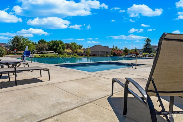 2843 E Murchison St, Meridian, ID 83642 - community pool featuring a patio