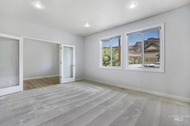 816 River View Dr, Twin Falls, ID 83301 - unfurnished bedroom with baseboards, visible vents, and recessed lighting