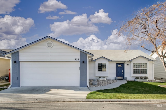 ranch-style house with a front yard and a garage