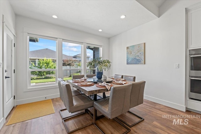 492 Applecreek St, Middleton, ID 83644 - dining space with light wood finished floors and recessed lighting