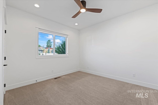 492 Applecreek St, Middleton, ID 83644 - empty room with light colored carpet, ceiling fan, and recessed lighting