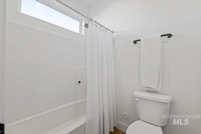 492 Applecreek St, Middleton, ID 83644 - bathroom featuring shower / tub combo with curtain and toilet