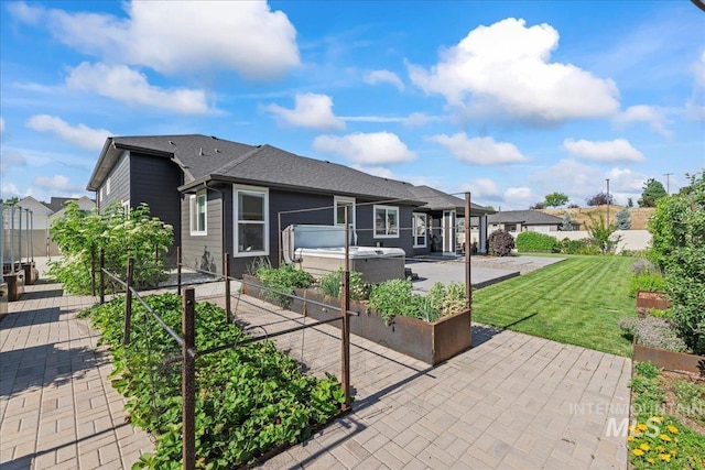 492 Applecreek St, Middleton, ID 83644 - rear view of house featuring a hot tub, a patio, a garden, and a yard
