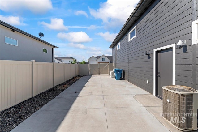 492 Applecreek St, Middleton, ID 83644 - view of patio featuring a gate and driveway
