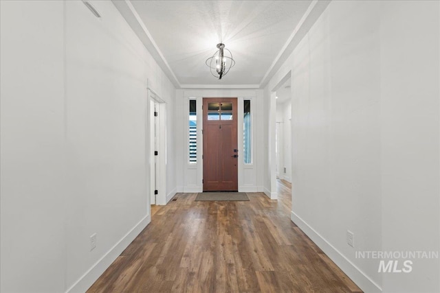492 Applecreek St, Middleton, ID 83644 - entryway with a chandelier and wood finished floors