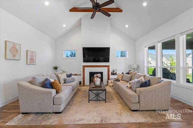 492 Applecreek St, Middleton, ID 83644 - living room with ceiling fan, high vaulted ceiling, wood finished floors, a tile fireplace, and recessed lighting