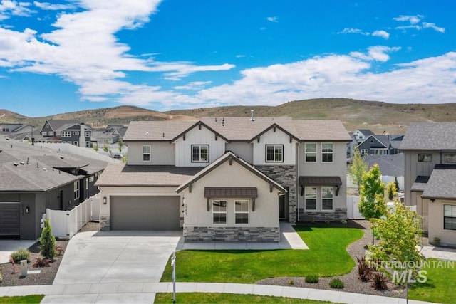 9351 W Sooty Grouse Ct, Boise, ID 83714 - view of front of house featuring stone siding, a residential view, and a mountain view