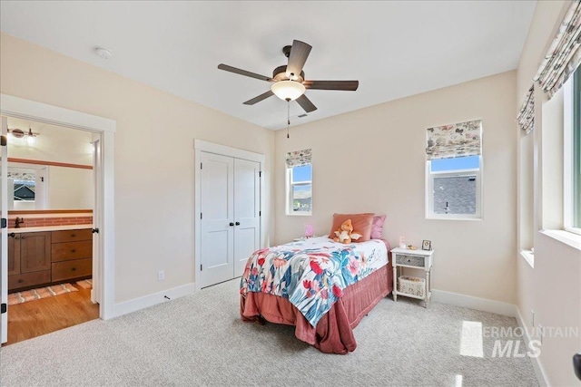 9351 W Sooty Grouse Ct, Boise, ID 83714 - bedroom with carpet flooring, baseboards, a closet, and a ceiling fan