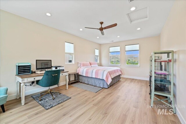 9351 W Sooty Grouse Ct, Boise, ID 83714 - bedroom with multiple windows, light wood-type flooring, and recessed lighting