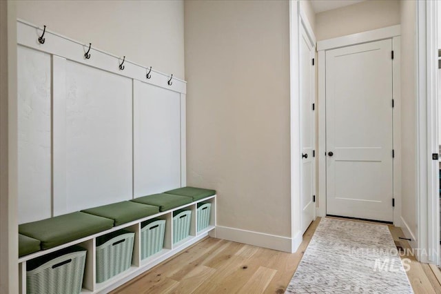 9351 W Sooty Grouse Ct, Boise, ID 83714 - mudroom with light wood-style flooring and baseboards