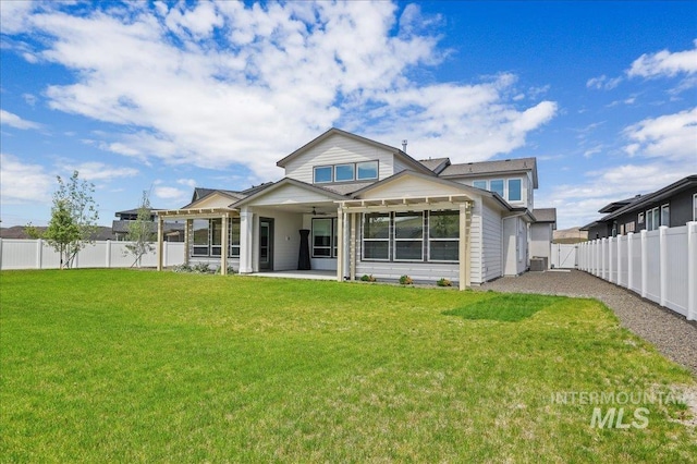 9351 W Sooty Grouse Ct, Boise, ID 83714 - rear view of property featuring central AC unit, a patio area, a sunroom, and a ceiling fan
