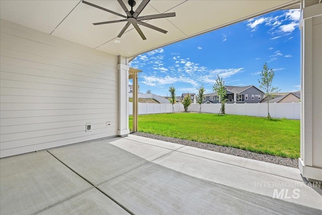 9351 W Sooty Grouse Ct, Boise, ID 83714 - view of patio / terrace featuring a ceiling fan and a residential view