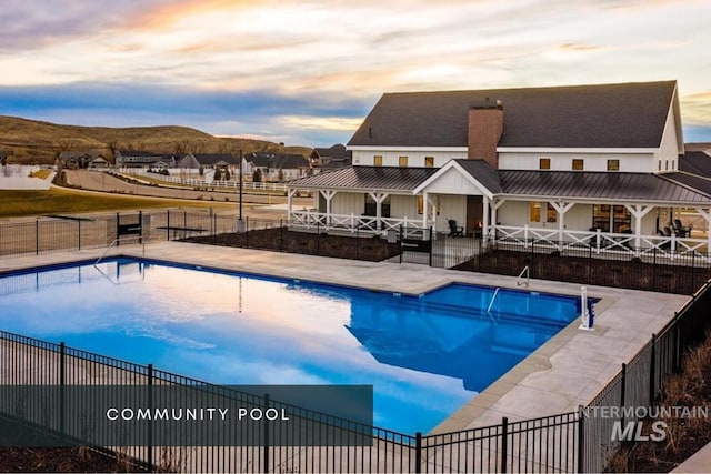 9351 W Sooty Grouse Ct, Boise, ID 83714 - view of swimming pool with a patio and a mountain view