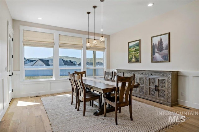 9351 W Sooty Grouse Ct, Boise, ID 83714 - dining space featuring light wood-style flooring and recessed lighting