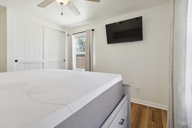 608 S Eagleson Rd, Boise, ID 83705 - bedroom featuring dark wood-type flooring, baseboards, and a ceiling fan