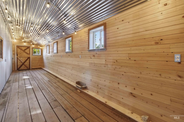 608 S Eagleson Rd, Boise, ID 83705 - corridor featuring wood walls, wood-type flooring, and lofted ceiling