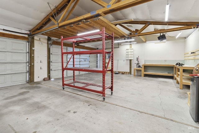 608 S Eagleson Rd, Boise, ID 83705 - garage featuring a workshop area and a garage door opener