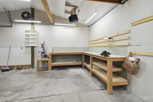 608 S Eagleson Rd, Boise, ID 83705 - garage with a workshop area and a garage door opener