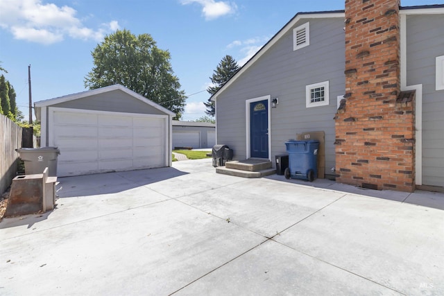 608 S Eagleson Rd, Boise, ID 83705 - view of side of home with a detached garage and an outbuilding
