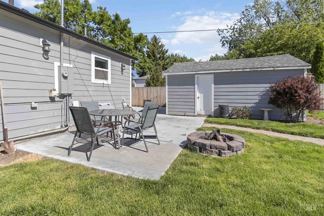 608 S Eagleson Rd, Boise, ID 83705 - view of patio with an outdoor fire pit and an outdoor structure