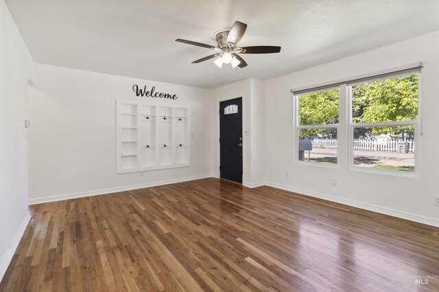 608 S Eagleson Rd, Boise, ID 83705 - unfurnished room with wood finished floors, baseboards, and ceiling fan