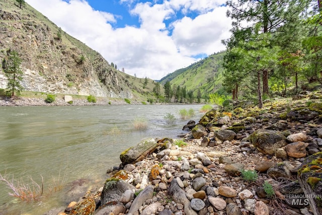 property view of water featuring a mountain view