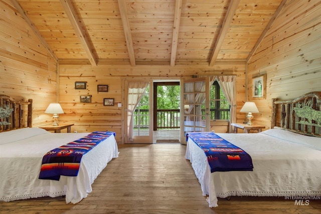 bedroom featuring wooden walls, wood ceiling, hardwood / wood-style floors, and vaulted ceiling with beams