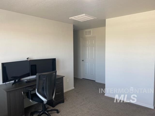 office area featuring light colored carpet