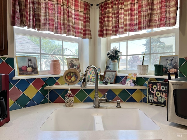 710 Locust St, Twin Falls, ID 83301 - kitchen view of light countertops and tasteful backsplash