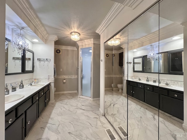 710 Locust St, Twin Falls, ID 83301 - full bathroom featuring a chandelier, marble look tiles, double vanity, ornamental molding, and a stall shower