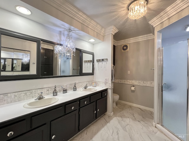 710 Locust St, Twin Falls, ID 83301 - bathroom featuring a chandelier, double vanity, marble finish flooring, a stall shower, and ornamental molding