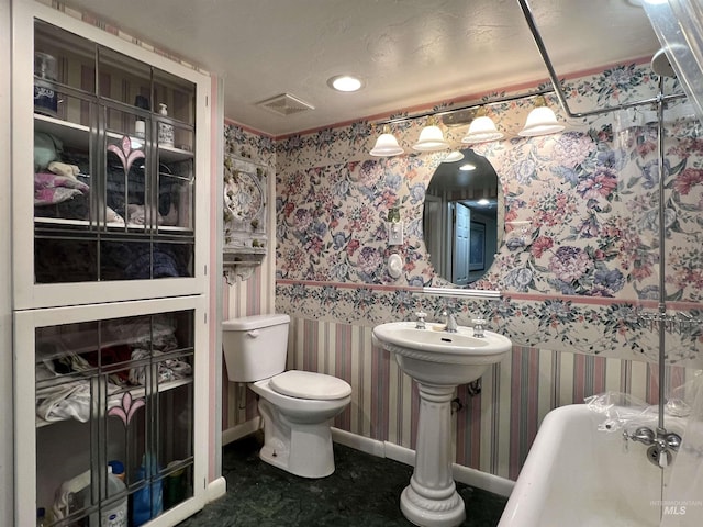 710 Locust St, Twin Falls, ID 83301 - full bathroom with wallpapered walls, a soaking tub, and recessed lighting