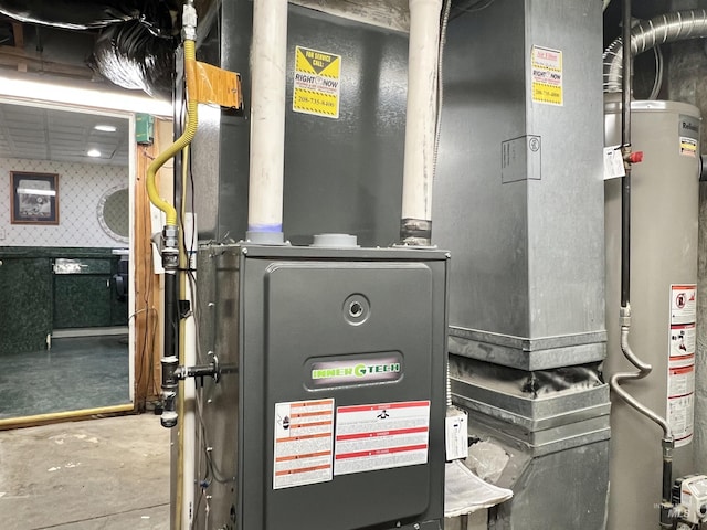 710 Locust St, Twin Falls, ID 83301 - utility room featuring gas water heater and heating unit