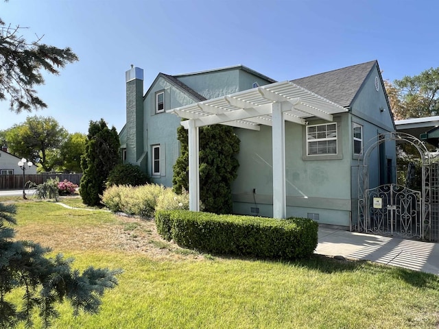 710 Locust St, Twin Falls, ID 83301 - view of property exterior featuring a pergola, a shingled roof, and a chimney