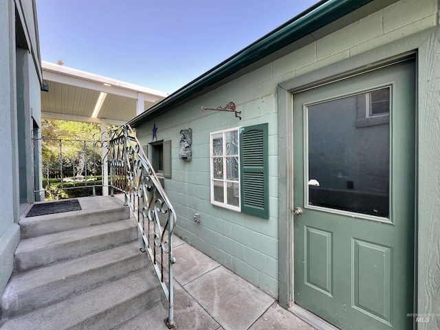 710 Locust St, Twin Falls, ID 83301 - doorway to property with concrete block siding