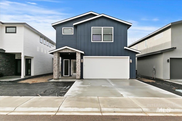 front facade with a garage