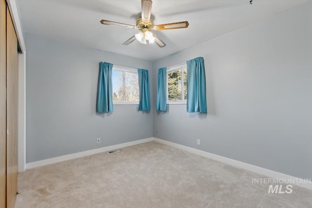 4320 N Locust Grv, Meridian, ID 83642 - carpeted spare room with baseboards, a ceiling fan, and visible vents