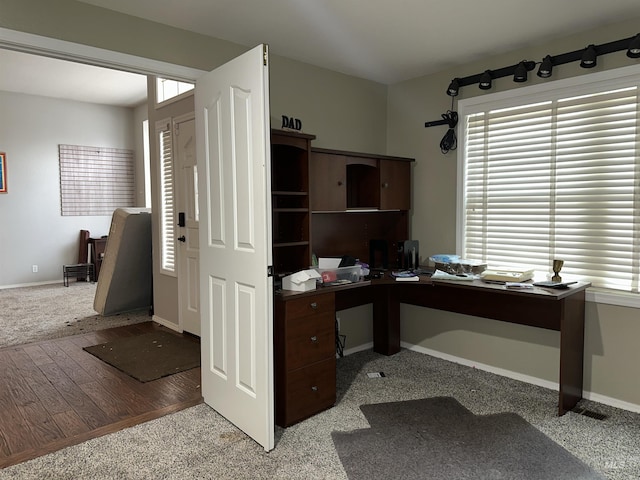 office space with light hardwood / wood-style flooring