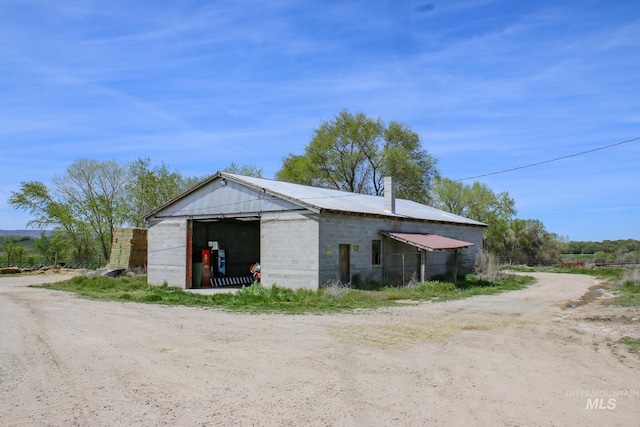 exterior space featuring an outdoor structure